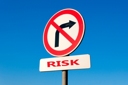 Risk on right traffic sign on blueskyの写真素材