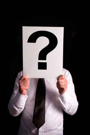 Businessman with a question mark over his headの写真素材