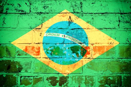 An old grunge flag of Brazil state on bricks の写真素材