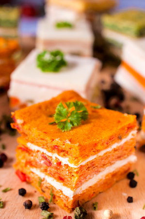 Carrot and soft cheese appetizer on the table の写真素材