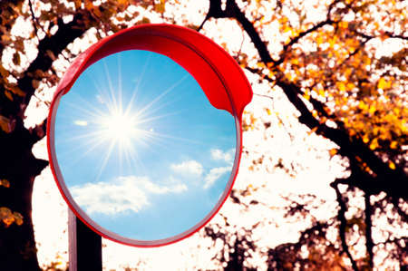 Sun and sky reflection in the mirror の写真素材