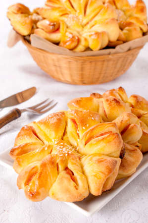 Homemade pastry with ham in the flower shape 