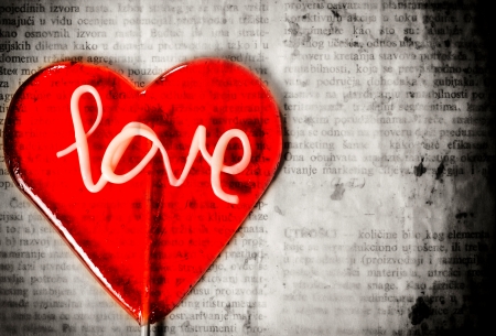 Selective colour red on the love lolly pop and black and white blank spaceの写真素材