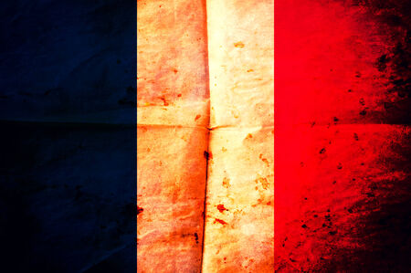 Old creased paper with France flagの写真素材