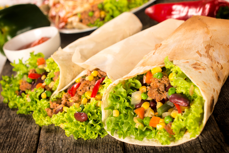 Selective focus on the right burrito sandwich の写真素材
