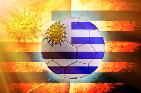 Soccer ball with Uruguayan flag as the backgroundの写真素材