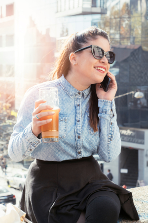 Female relaxing with glass of beer,selective focusの写真素材