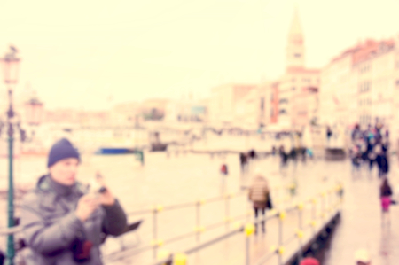 Sun and people in the city vintage blurred backgroundの写真素材