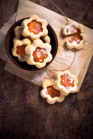 Jelly cookies flower shape on wooden background,selective focusの写真素材