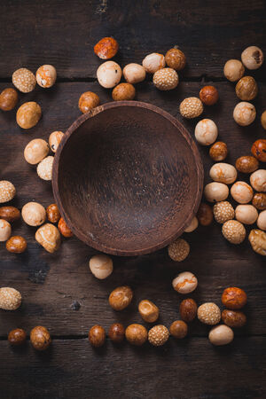 Empty bowl in the middle of Asian peanuts snack,selective focusの写真素材
