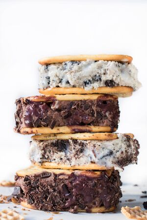 Stack of ice cream sandwiches on white backgroundの写真素材