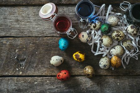 Easter colorful eggs in the nest from aboveの写真素材