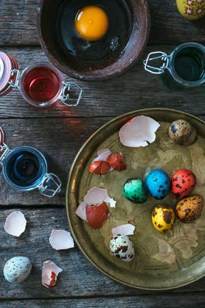 Easter decorative eggs from above on the wooden backgroundの写真素材