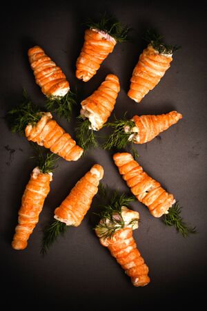Easter carrots pastry stuffed with saladの写真素材