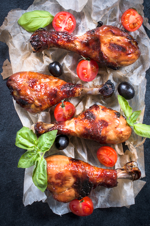 Sweet fried chicken drumsticks with honey and spices from aboveの写真素材