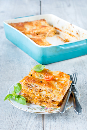 Slice of traditional Italian dish lasagna in the plate,selective focusの写真素材