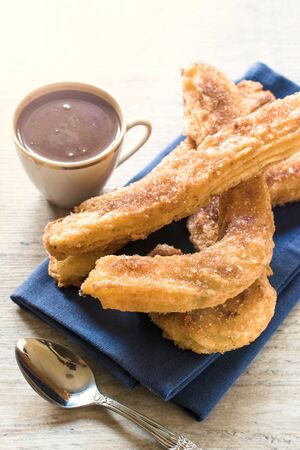 Sweet homemade churros and hot chocolate,selective focusの写真素材