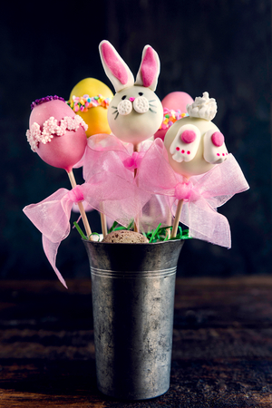 Easter concept with cake pops in metal glass,selective focusの写真素材