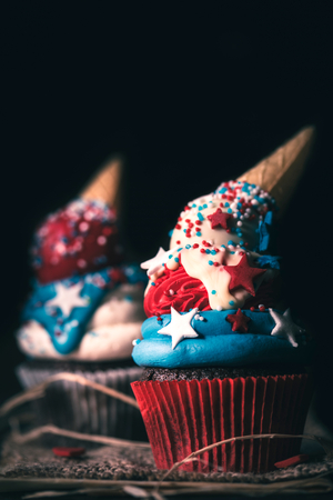 Sweet homemade cup cake with USA flag decoration,independence day concept,selective focusの写真素材