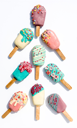 Cake pops ice creams on white backgroundの写真素材