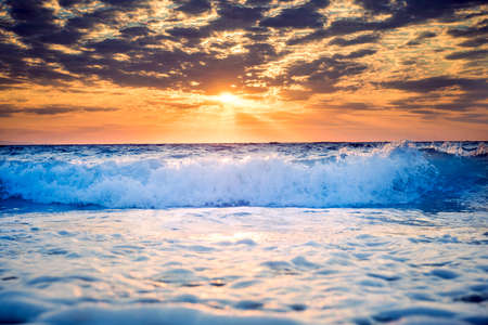 Beautiful sunset over the sea in long exposure as background