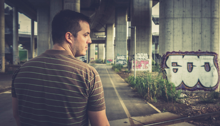 Man from the back with urban scene in backgroundの写真素材