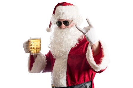Santa Claus holding beer,isolated on white backgroundの写真素材