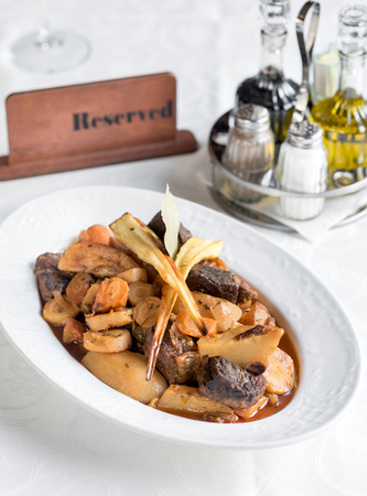 Roasted beef and potatoes in spicy sauce,selective focusの写真素材