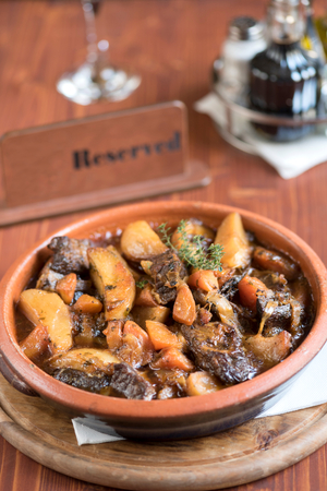 Beef and potatoes in spicy sauce served,selective focusの写真素材