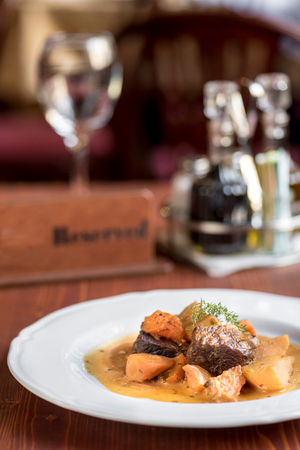 Beef and potatoes in spicy sauce in the plate,selective focusの写真素材