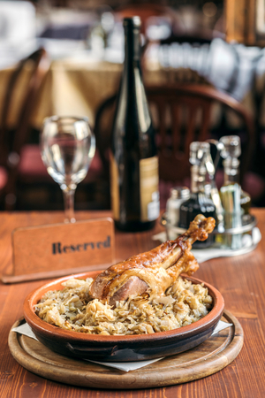 Turkey drumstick in cooked cabbage served,selective focusの写真素材