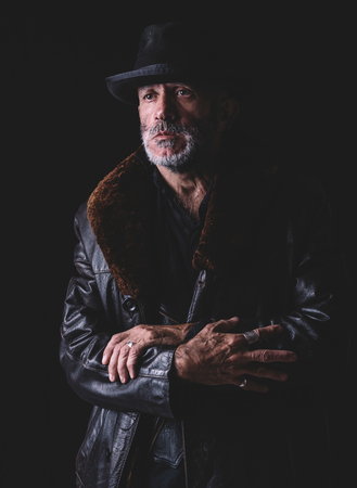 Portrait of urban senior in low keyの写真素材