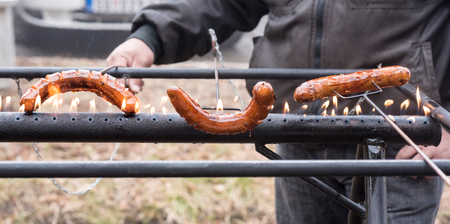 Beef sausages on the fire,selective focus