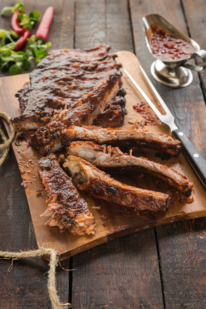 SLiced beef ribs on the wooden board,selective focusの写真素材