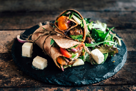 Tortilla wraps with ground meat balls and salad,selective focus 
