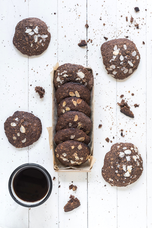 Oats and chocolate cookies served on the white wooden backgroundの写真素材