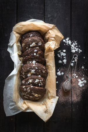 Chocolate and oats cookies on wooden backgroundの写真素材