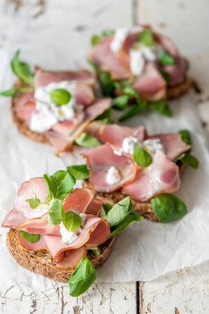 Served Toast sandwiches with prosciutto and cream cheese,selective focusの写真素材