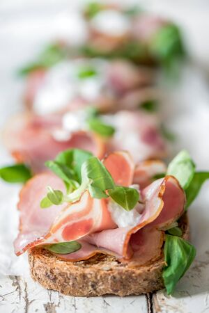 Close up to toast sandwich with prosciutto and cream cheeseの写真素材