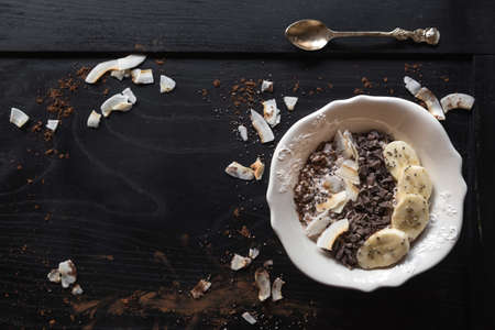 Served healthy oeatmeal on the table with blank spaceの写真素材