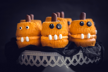 Scary cup cakes served,halloween decorationの写真素材
