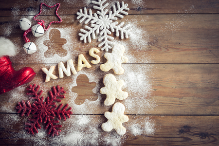 Xmas homemade cookies on wooden background with blank space の写真素材