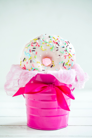 Sweet glazed donut with white creamの写真素材