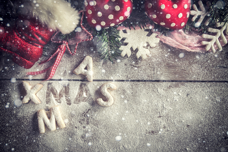 Xmas gingerbread cookies on wooden background with blank spaceの写真素材