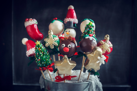Close up to Christmas cake pops on dark backgroundの写真素材