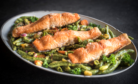 Salmon and spinach spaghetti served in the plate,selective focusの写真素材