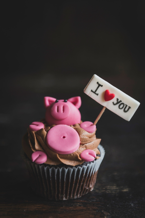 Pig cup cake with I love you sign,selective focus and valentines day conceptの写真素材