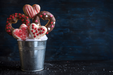 Heart shape donuts in the metal basket,selective focus and blank space の写真素材