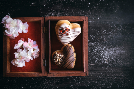 Heart shape donuts in the box,selective focus and blank space の写真素材