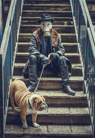 Man and English bulldog on the stairs,selective focus の写真素材